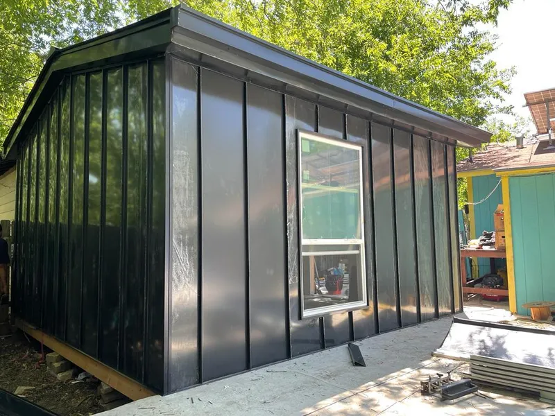 Black standing seam metal wall panels for Roof Inspection in Maple Valley