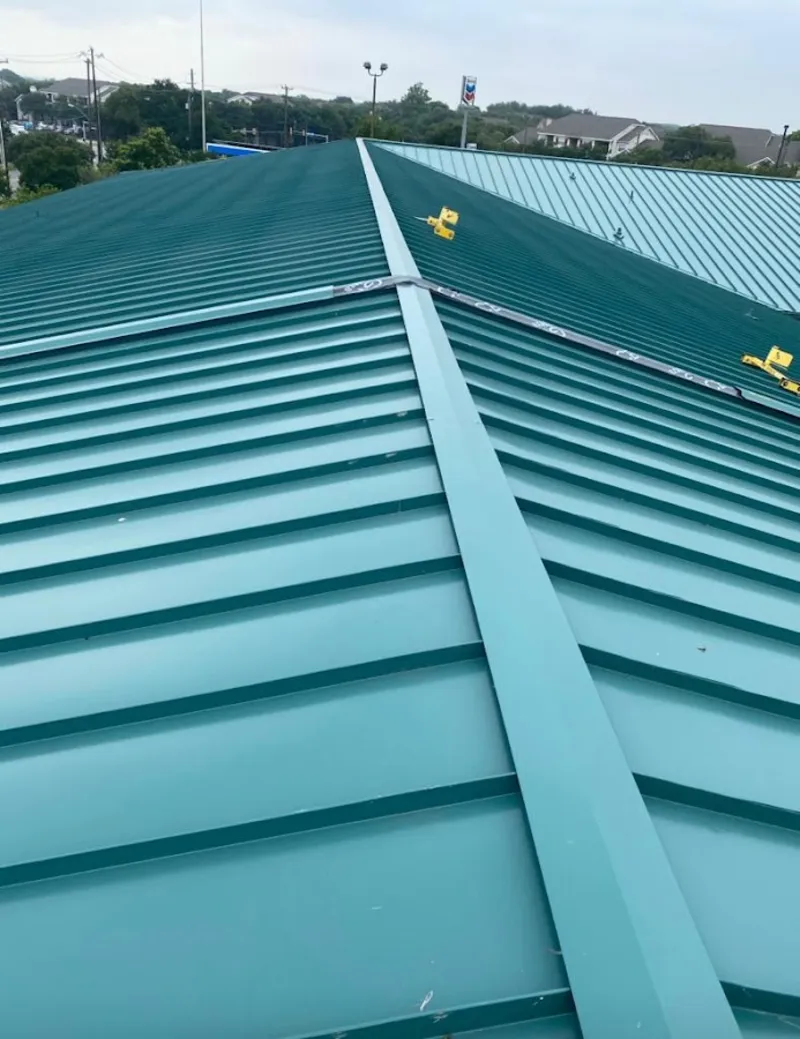 Green commercial metal roof ridge and valley for Metal Roof Repair in Maple Valley